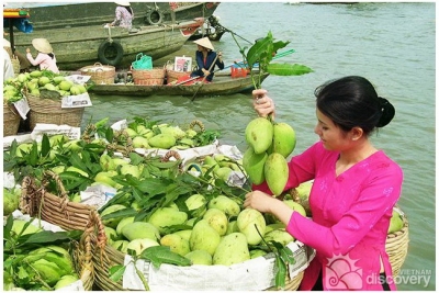 Mangoes in Cai Be Floating Market - Mekong River Tours