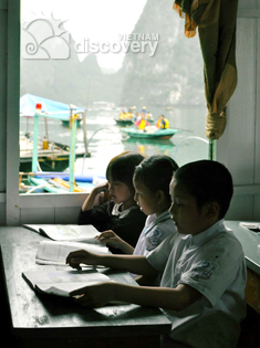 Children at Cua Van Floating Village Halong Bay tour