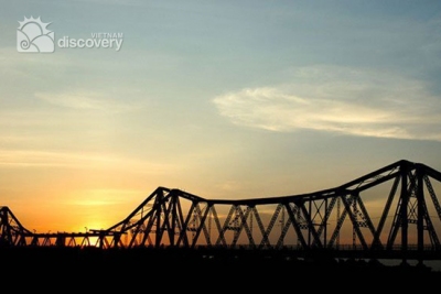 Sunrise over Long Bien Bridge 24 hour Hanoi city tour
