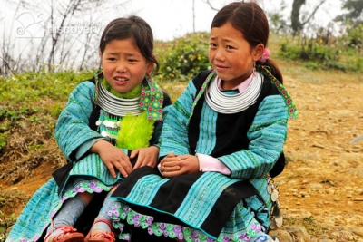 Two H'mong girls wearning necklaces - Vietnam Northwest Tour